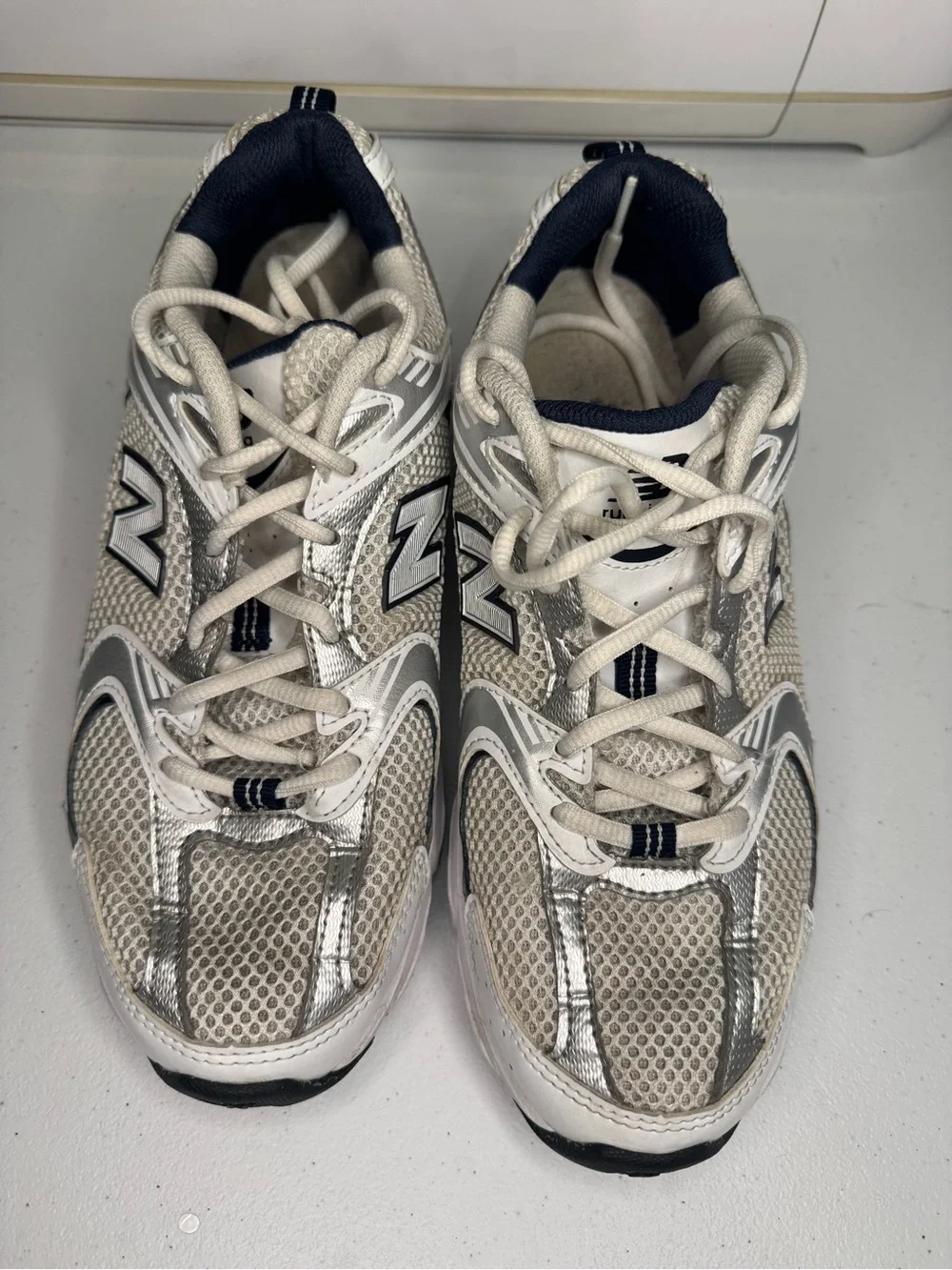 New Balance White and Silver Athletic Sneakers